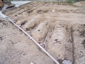 Digging trenches for aerobic septic system