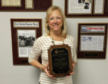 Pam Van Delden wins Excellence in Service Award from NAWT